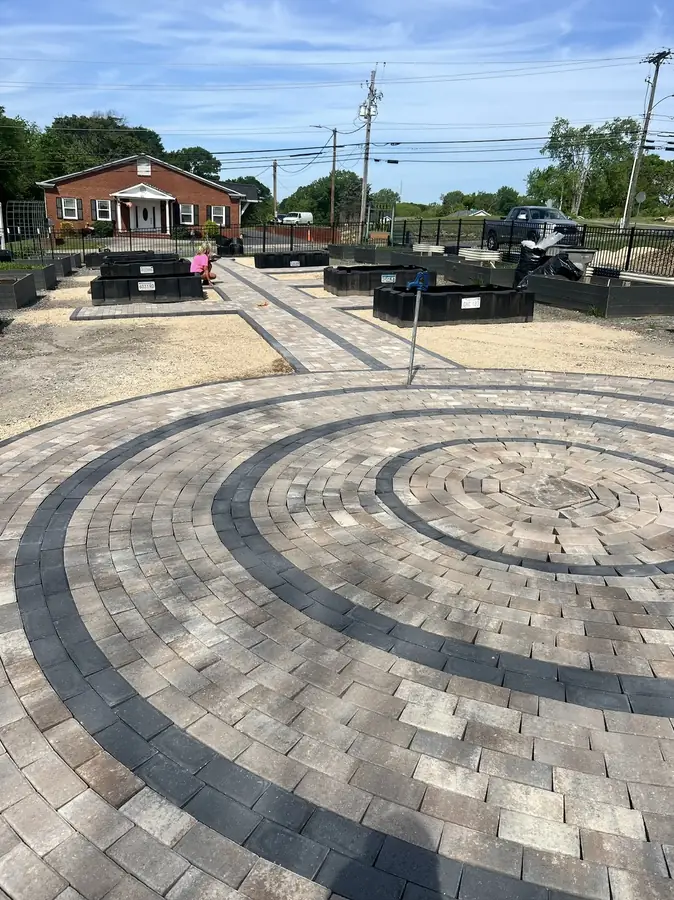 Circular paver patio with contrasting banding