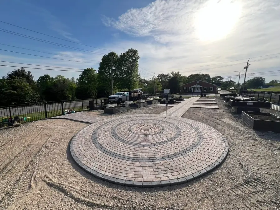 Wide view of circular paver patio