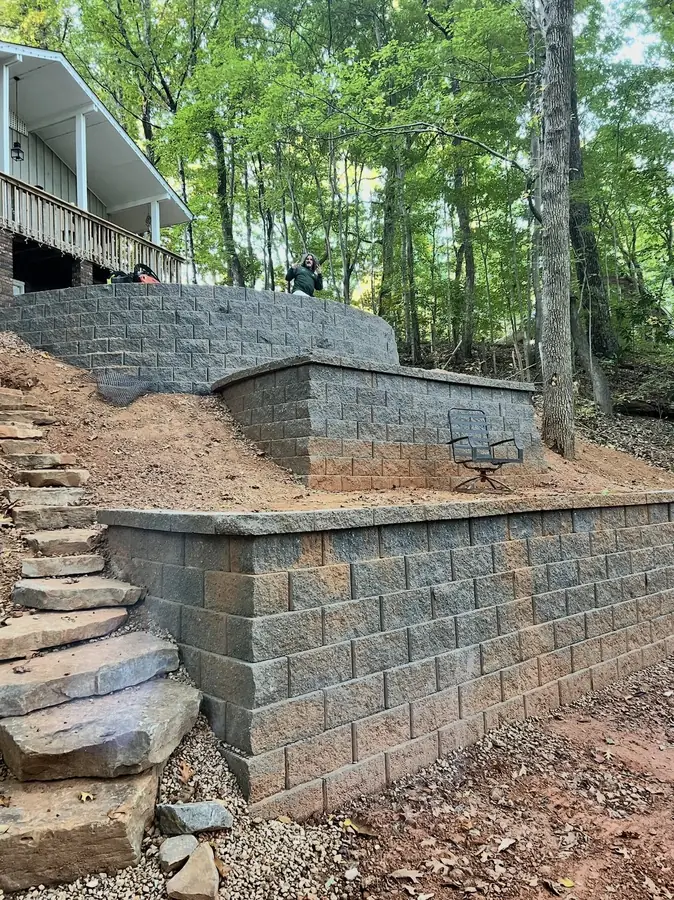 Tiered retaining wall with stone steps